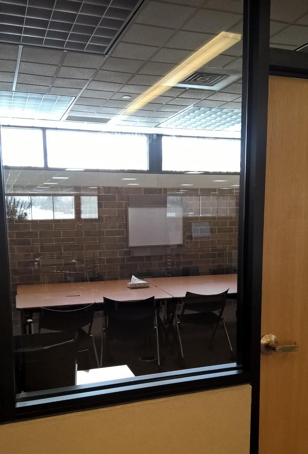 Tables and chairs set up in HPL's multi-purpose room